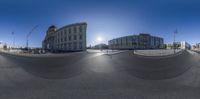 an image of a skateboarder doing tricks in front of the camera and buildings