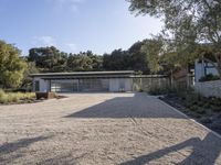 the modern house is located in the country landscape of a california hill country estate near santa cruz, cal