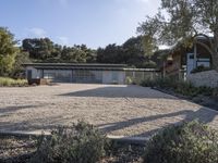 the modern house is located in the country landscape of a california hill country estate near santa cruz, cal