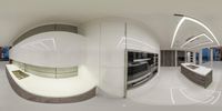 the fisheye lens shot shows a modern kitchen with stainless steel appliances and modern lighting