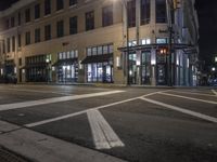 Modern Mixed-Use Building at Night in the City
