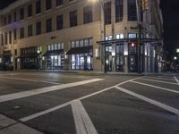 Modern Mixed-Use Building at Night in the City