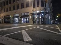 Modern Mixed-Use Building at Night in the City