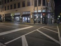 Modern Mixed-Use Building at Night in the City
