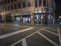 Modern Mixed-Use Building at Night in the City