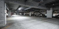 the parking garage has plenty of equipment for all cars in it's space where people can park