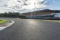 a photo of the asphalt that goes around the corner for racing track markings and markings