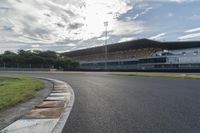 a photo of the asphalt that goes around the corner for racing track markings and markings