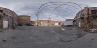 some buildings and cars near one another in the picture fisheye - style 3d picture