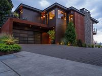 the home has a nicely designed driveway that leads to the house's main entrance