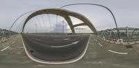 the view of a modern road bridge from an angle looking out of a 360 - ball lens