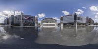 this is an 360 - view view of the outside of a shopping center in italy