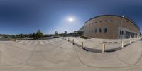 a very pretty skate park with some big ramps for riding it and a nice bright sun