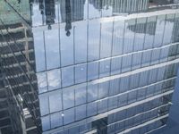 Modern Skyscraper in Metropolis with Glass Walls 002