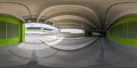 a fisheye lens image of a subway stop at the subway station in tokyo, japan