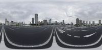 a city view of an empty road with multiple lanes on both side of it in the air