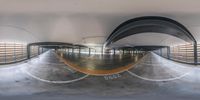 this is a 360 - angle view of the interior of an underground building with a ramp