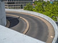 a car is driving on the highway through an underground parking garage area in a city