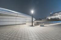 Modern Urban Plaza at Night with Artificial Lights