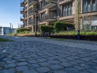 Modern Urban Road in Europe: Cobblestones and Cityscape