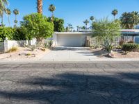 a small palm tree is in the front yard of a house that's on sale for $ 655, 000