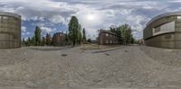 a circular view looking at a cobblestone road from a point of view lens