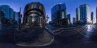 an image of a city taken from the street and a fisheye lens on the ground