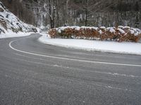 Moody Landscape: Grey Sky and Snow Covered Road