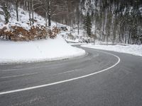 Moody Landscape: Grey Sky and Snow Covered Road