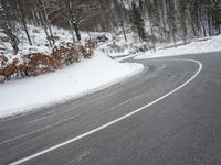 Moody Landscape: Grey Sky and Snow Covered Road