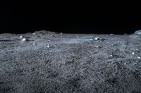 a photo of an object on the moon with other objects and pieces of equipment on the ground