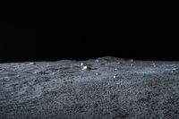 a photo of an object on the moon with other objects and pieces of equipment on the ground