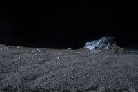 an alien landscape with rocks on the moon surface and a large rock in the middle