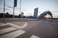 the view of two lanes and the bridge, from behind them on a vehicle's driving