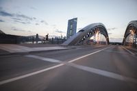 the view of two lanes and the bridge, from behind them on a vehicle's driving