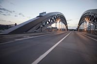 the view of two lanes and the bridge, from behind them on a vehicle's driving