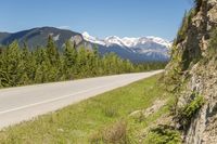 an image of a mountain highway in the summertime for a landscape photography concept photo