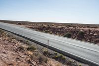 Mountain Highway Through Red Rock Landscape
