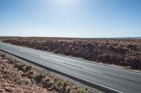 Mountain Highway Through Red Rock Landscape