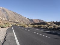 this is an image of a highway in the mountains that is blocked from traffic due to high winds