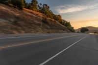 Mountain Landscape: Asphalt Road at Dawn