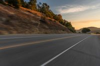 Mountain Landscape: Asphalt Road at Dawn