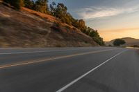 Mountain Landscape: Asphalt Road at Dawn