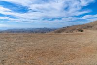 Mountain Landscape: Rolling Hills and Grassy Plains