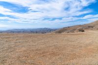 Mountain Landscape: Rolling Hills and Grassy Plains