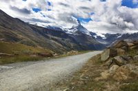 Mountain Landscape in Switzerland: Grass and Clouds