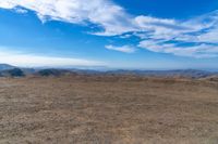 Mountain Landscape View with Cumulus Clouds