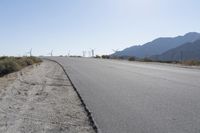 Mountain Landscape with Winding Road in Rural Area