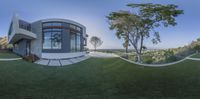 an expansive, circular residence in the mountains near san diego, california, usa with expansive landscape and views