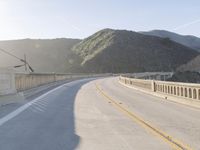 Mountain Road: Asphalt Underneath a Clear Sky